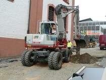 Takeuchi TB 175 W der Firma  LEINBERGER  steht auf einer der vielen innerstdtischen Baustellen in Fulda, Mai 2011