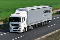 MAN TGX 18.440  Transa  auf der A61 bei Miel - 28.04.2011