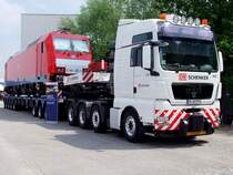 MAN TGX41.680 V8 von DB-Schenker hatte E186 329-9 zur Transport-Logistic2011 gebracht;110513