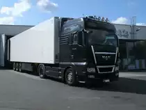 Berliner MAN-Sattelzug.am 10.Juni 2011,bei der Warenlieferung in Bergen/R�gen.