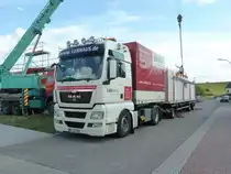 MAN TGX von LUX-Haus steht in 36100 Petersberg-Marbach zur Entladung, Juni 2011