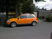 Oranger Gross Polo, am 09.06.2011 in Lehrte.