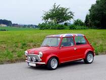 MINI mit der britischen Flagge am Dach, tourt durchs Salzkammergut;110703