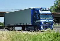 Volvo FH12 460  TCL  auf der A61 bei Miel - 28.06.2011