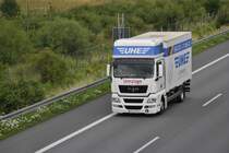 MAN mit Kofferbau, in Lehrte auf der A2 am 21.07.2011.