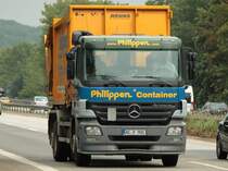 Mercedes Actros mit Presscontainer am 26.07.2011 auf der A4 kurz vor der Niederlndischen Grenze.