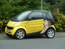 Smart als Werbetr�ger f�r die Druckerei Nass, gesehen in Taunusstein-Wehen im August 2011