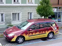 FORD-Kombi mit  feuriger  Werbebeklebung;110804