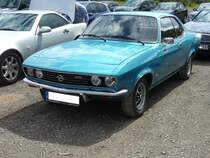 Opel Manta A. 1970 - 1975. Der Manta A war Opels Antwort auf den sehr erfolgreichen Ford Capri. Den im Farbton XX lagoblau lackierten Wagen mit Sportstahlfelgen, konnte ich am 07.08.2011 auf dem Besucherparkplatz der Kokerei Zollverein in Essen ablichten.