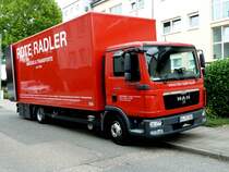 MAN des Umzugsunternehmens  ROTE RADLER  gesehen in Karlsruhe-Durlach, August 2011