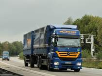 Axor Hngerzug am 12.08.2011 auf der A4 kurz hinter der Niederlndischen Grenze.