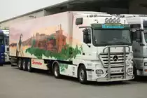 Der Andalusien-Truck der Firma Schumacher, ein Actros 1854 mit Kühlauflieger, am 23.07.2011 in Würselen bei Aachen.