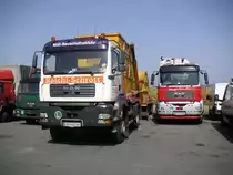 MAN TGA 18.350 Absetzkipper von Reichl Schrott und ein TGA 26.350 von Saubermacher verbringen das Wochenende in Gralla.4.9.2011