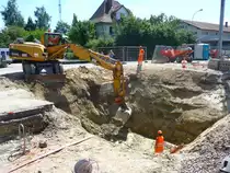 Bagger Caterpillar M 315 C in T�uffelen beim Bahnhofumbau am 10.08.2011
