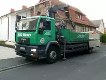 MAN der Holzhandlung STRUPP liefert Baumaterial nach 36100 Petersberg-Marbach, September 2011
