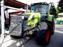 CLAAS ARION620 ist mit 700kg Frontgewicht ausgerstet;110912