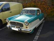 Nash Metropolitan Coupe. 1954 - 1962. Der Metropolitan wurde bei Austin gefertigt und war Anfangs mit dem Motor des Austin A40 bestckt. Ab 1956 wurde dann der 1.5l Motor des Austin A50 Cambridge verbaut. Der Metropolitan verkaufte sich in den USA ca. 95.000 mal. In Europa, hauptschlich Grobritanien, wurden noch einmal ca. 10.000 Einheiten abgesetzt. Es gab eine Coupe- und eine Cabrioletversion. Besucherparkplatz der Classic Remise am 01.11.2011.