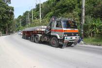 Nissan UD Sattelzug am 04.Nov. 2011 zwischen Kamala und Patong.
Das Video zum Bild gibt's unter:
http://www.busvideos.eu/name/einzelbild/number/724/kategorie/suchen/suchbegriff/Karl+Seltenhammer.html