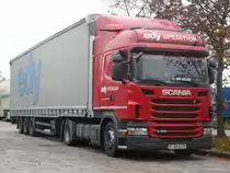 Scania G400  Edy Spedition  aus Rum�nien auf der Rastanlage  Frankenh�he  an der A6, 11.11.2011 