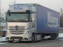 Ein neuer Mercedes-Benz Actros 1845 der Spedition Maiweg auf einem Parkplatz an der A9 Nrnberg-Mnchen, 01.02.2012