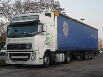 Volvo FH 460 von  JASFBG Transbud-Katowice  aus Polen auf der Rastanlage Frankenhhe an der A6, 25.11.2011 