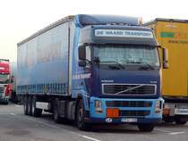 Volvo FH12 420 von  De Waard  aus Litauen auf einem Parkplatz bei Ulm, 18.03.2012