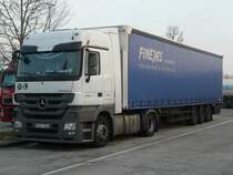 MB Actros 1844 MP3 von  Finejas  aus Litauen auf der Rastanlage Leipheim an der A8, 18.03.2012