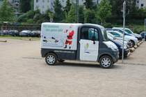 Noch greller zu den beiden folgenden Bildern kann der Gegensatz nicht sein. Hier steht ein MEGA-Kleinlieferwagen, eine drollige Plastikknutschkugel auf dem LGA-Gelnde in Bingen. Diese Fahrzeuge stammen aus Frankreich und haben in Bochum ihre deutsche Vertretung