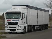 MAN TGX 18.440 mit Schubbodenauflieger von Wagner Transporte abgestellt in Crailsheim, 18.03.2012