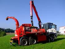 MAN TGS33.540 mit Aufbau  BIBER92 , welcher Baumstmme bis 75cm Durchmesser zu  Holzhackschnitzeln verarbeiten kann; 110821