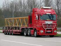 MB Actros MP3 (6x2) Tieflader der Spedition Vgel aus sterreich auf der Rastanlage Ellwanger Berge, 06.04.2012