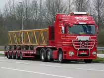 MB Actros MP3 (6x2) Tieflader der Spedition V�gel aus �sterreich auf der Rastanlage Ellwanger Berge, 06.04.2012