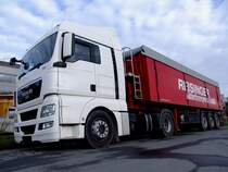 MAN TGX 18.440 mit Schubbodenauflieger; 120421