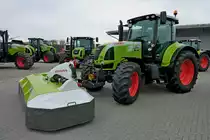 Claas Arion 620, mit angebautem Frontmhwerk, Mrz 2012 