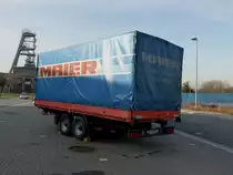 Heckansicht Tandemanh�nger Pritsche Plane MAIER Singen / Hagen
mit Blick auf den alten F�rderturm der Zeche Ewald in Herten 17/01/2012 

