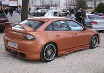 Mazda 323 anspruchsvoll getunert, fotografiert auf dem Carstyling Tuning Show 2012