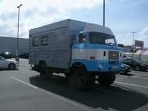 IFA W50 als Wohnmobil,am 02.Juli 2012,vor einem Supermarkt in Bergen/Rgen.