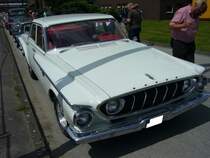 Dodge Dart 330 4-door Sedan von 1962. Der Dart war die mittlere Ausstattungsvariante dieses extravagant gezeichneten Wagens. Darunter rangierte das Modell Polara und darber der Custom 880. Oldtimertreffen Kokerei Zollverein am 01.07.2012.