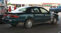 5.7.2012 Laramie, WY. Ein mit duct tape verarzteter Ford Contour. Sieht fragwrdig aus, scheint jedoch zu halten.