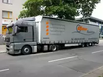 MAN TGX 18.400 Lowliner mit M�slein-Auflieger am 07.07.2012 abgestellt in Berlin