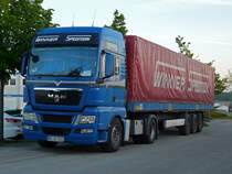 MAN TGX der Spedition Winner abgestellt in einem Industriegebiet in Crailsheim, 17.05.2012