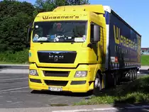 1.8.12/ MAN TGX 18.440 Pritschenauflieger vom Logisticer Waberer`s..