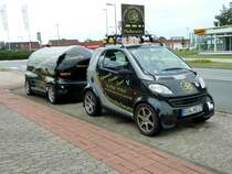 Smart der  Zevener Fahrradscheune  mit Anhnger, August 2012