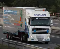 DAF XF von  Schwaiger Transporte  aus �sterreich unterwegs auf der BAB 6 zwischen Crailsheim und Kirchberg am Abend des 07.08.2012. 