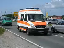 Dieser Mercedes RTW,von der Rettungswache Kluis,befand sich,am 09.August 2012,nicht im Einsatz,so das ich Diesen in Bergen/R�gen antraff.