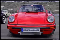 Ein roter Porsche Carrera beim K�fertreffen am 8. Juli 2012 an der Steintrib�ne in N�rnberg.