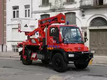 Mehrzweckfahrzeug Mercedes-Benz Unimog U400 Aufbau Assaloni.Com S.p.A. der Feuerwehr Namur, Aufnahme am 21.07.2010 in Brussel nach Anlass des Nationalfeiertags 
