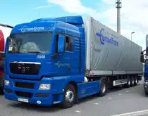 MAN TGX Xl Europe Trans Pritschen Planensattelzug in Herten bei einer Pause am 15.05.2012