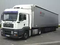 MAN TGA LX Breidenbach mit Gardinenplanen Sattelauflieger F&K Trailer Group 
in Herten am 28.08.2012