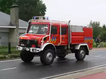 Waldbrand-Tankl�schfahrzeug Mercedes-Benz Unimog U2150L Aufbau Rosenbauer der Feuerwehr Kasterlee (Zone Taxandria), ehemaliges TLF aus Spanien, Aufnahme am 30.05.2010 in Wuustwezel aus Anlass der Umzug f�r 175 Jahr-Feier brandweer Wuustwezel 

